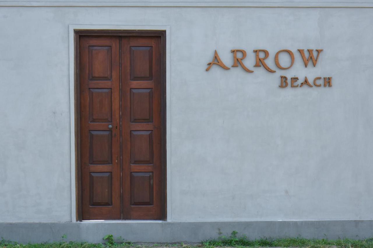 Arrow *